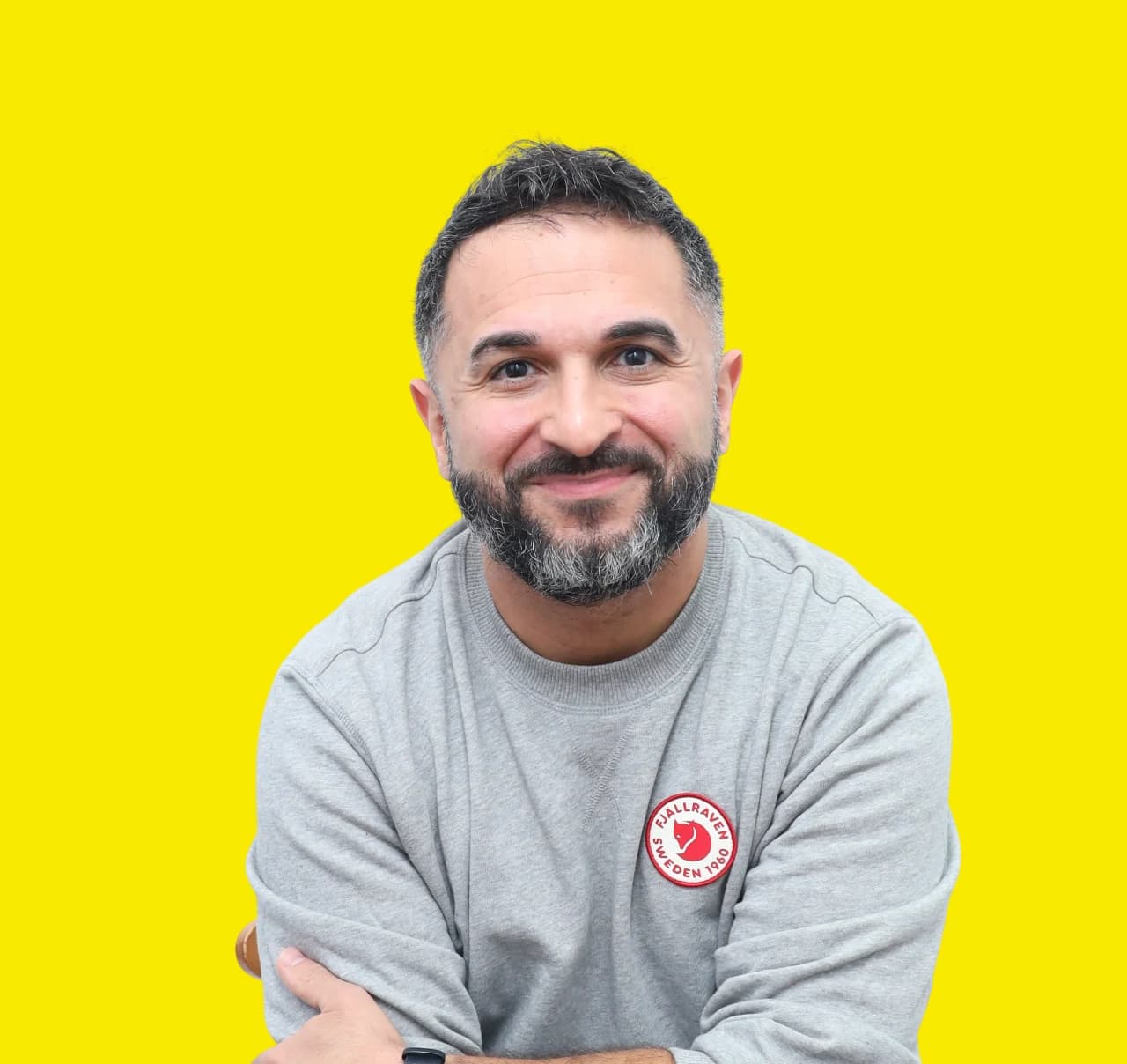 Leo Morejon headshot on yellow background